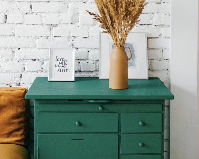 green drawer, vase and frames